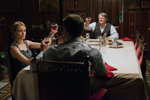 Photo of Hank Rearden, Dagny Taggart, and Ellis Wyatt toasting over the success of the John Galt Line