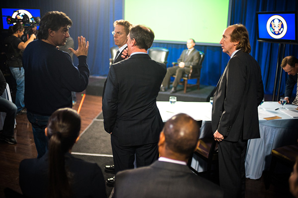 Photo of Jim Manera directing Greg Germann, Louis Herthum, and Larry Cedar in ASP3